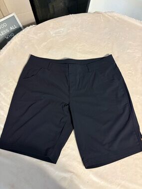 Lucy Black Athletic Shorts with Orange Brand Tag
